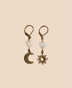 Cute hand-crafted boho earrings. Two 24k gold plated charms, two freshwater pearl hearts and 24k stainless steel gold plated studs pimp your ears up like crazy!  🌸 stainless steel ear studs, 24k gold plated  🌸 anti allergic  🌸 24k gold plated charms 🌙 🌞 moon and sun charms  🐚 real freshwater pearl hearts   This jewellery is your personal talisman. Shine your light with an individually and carefully handcrafted piece, that suits just YOU. You deserve to feel protected, safe and beautiful. T Handmade Delicate Yellow Gold Pearl Earrings, Delicate Handmade Yellow Gold Pearl Earrings, Dainty Handmade Gold Pearl Earrings, Handmade Yellow Gold Plated Pearl Earrings, Delicate Handmade Gold Pearl Earrings, Dangle Brass Earrings With Pearl Charm, Dangle Earrings With Pearl Charm In Brass, Brass Dangle Earrings With Pearl Charm, Handmade Gold Pearl Earrings For Gift