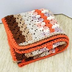 two crocheted blankets folded on top of each other