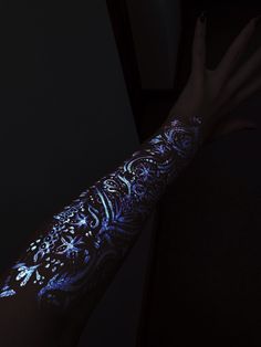 a person with a tattoo on their arm