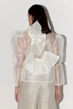 Shop for FEBo6 White Silk Organza Swan Layered Ruffle Top for Women Online at Aza Fashions Feminine Organza Evening Tops, Feminine Organza Tops For Evening, Chic Ruffled Silk Chiffon Blouse, Silk Ruffled Blouse For Party, Silk Ruffle Blouse For Party, Feminine Organza Blouse For Parties, Elegant Organza Tops With Ruffles, Elegant Ruffled Organza Tops, Formal Organza Blouse With Ruffles