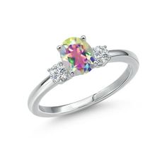 a white gold ring with an oval cut rainbow and round brilliant czr stones