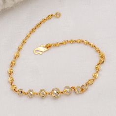 Please click -- Learn more about this item -- below for a full description 22k gold chain bracelet chain handmade jewelry made in India 22k yellow gold chain bracelet handmade jewelry for women Pretty gift for women, Indian gold 22kt jewelry Christmas Present  length is 6.5 Inch approx.  width is 5.5/2 millimeter approx.   weight is 4.76 grams approx. please message me if you have any query.                                      Returns & exchanges & Cancellations              If any return or Ca Gold Bracelet Chain Women, Gold Bracelets For Women Indian, Bracelets Gold Simple For Women, 22k Gold Chain, 22k Gold Bracelet, Bracelet For Women Gold, Gold Bracelet Simple, New Gold Jewellery Designs, Gold Earrings Models