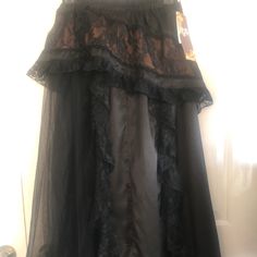 Nwt Lots Of Detail In This Long Black Lace Skirt. Pull On, Elastic Waist. Black “Striped” Panel In The Middle (Front & Back), Outlined In Black Tulle On The Sides. Lace Overlay At The Top (Featuring A Coppery-Color Background; Detailed Lower Panel Featuring Same Lace Overlay. Size Not Marked But Estimate It To Be A Sml/Xs. Measurements Can Be Provided Upon Request. Great For Costume, Dancing, Or Special Occasion. Smoke Free Home. Black Tiered Skirt For Costume Party, Gothic Black Ruffled Skirt, Black Pleated Skirt For Costume Party, Black Lined Skirt For Costume Party, Gothic Black Lined Skirt, Black Ruffled Skirt For Costume Party, Black Long Skirt For Costume Party, Black Flowy Gothic Maxi Skirt, Gothic Flowy Black Maxi Skirt