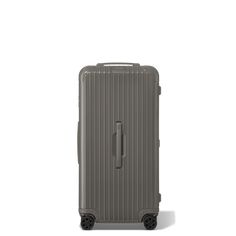 Made of high-performance polycarbonate, RIMOWA Essential is a reliable and lightweight suitcase for your journeys ahead. Find the best travel companion for your business or leisure travels from a vast range of colors and finishes. Ideal for 2 weeks or more of travel, the RIMOWA Essential Trunk Plus in gloss Slate grey features several sophisticated functionalities: - Stage-free telescopic handle - RIMOWA Multiwheel® System - TSA-approved locks - Dual-organization interior Includes a complimentary leather luggage tag and sticker set. Rimowa Trunk Plus, Rimowa Trunk, Olympic Airlines, Rimowa Essential, Air Transat, Vietnam Airlines, Air China, Lightweight Suitcase, Leather Luggage Tag