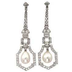 A pair of Art Deco natural pearl and diamond drop earrings, each earring comprising a pear-shaped natural pearl drop, Precious Stone Laboratory certificate, to the centre of a geometric openwork diamond-set cluster surround, from a run of brilliant-, trilliant- and baguette-cut diamonds in a geometric design, estimated to weigh a total of 2.2 carats for both earrings, all set in platinum to a hook and screw fitting, circa 1920, measuring approximately 5.1 x 1.4cm, gross weight 10.4 grams. A pair Dream Earrings, Art Deco Drop Earrings, Bijoux Art Deco, Bijoux Art Nouveau, Vintage Drop Earrings, Pearl And Diamond Earrings, Art Deco Earrings, Diamond Drop Earrings, Natural Pearl