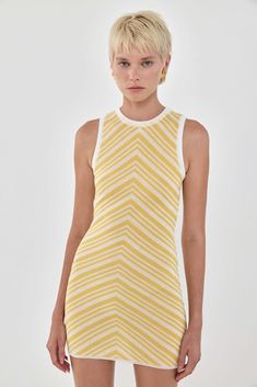 Manifesting a French Riviera summer. The ultimate summer knit mini dress. Contrast finish. Open back. Body hugging material, ultra flattering. Style it with your favorite kitten heels and large golden earrings for an effortlessly stylish summer look. 62% Viscose 22% Polyester 8% Tencel 8% Linen Color: Yellow Pattern Care: Hand wash only in cold lukewarm water. Do not hang. Do not bleach. Do not tumble dry. Do not wring. Dry flat. Dry clean in any solvent except trichlnorythene. Fits true to size Fitted Knit Mini Dress For Summer, Chic Knit Mini Dress For Summer, Summer Knit Bodycon Mini Dress, Summer Bodycon Knit Mini Dress, Knit Mini Dress For Summer, Summer Knit Mini Dress For Day Out, Fitted Knit Summer Mini Dress, Fitted Summer Knit Mini Dress, Summer Fitted Knit Mini Dress