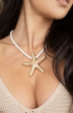 A gleaming starfish pendant anchors the ropy cord of this sea-inspired necklace sure to make a statement. 15" length; 3" extender Lobster clasp closure 18k-gold plate/textile Imported Gold Nautical Jewelry For The Beach, Gold Nautical Jewelry For Beach, Nautical Style Gold Jewelry For The Beach, Makeup Accesories, Starfish Pendant, Trending Necklaces, Starfish Necklace, Sea Inspired, Silk Cord