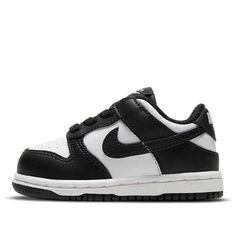 Best gifts for newborns/babies! The Nike Dunk Low TD Black White is a toddlers shoe that features a classic black and white colorway. It is made with leather and has a white base with black overlays. The Swoosh branding is black, and the shoe has a lightly padded nylon tongue. The tooling is two-toned, with a rubber outsole that draws from the Air Jordan 1 for traction. Toddler Jordans, Baby Boy Shoes Nike, Baby Nike Shoes, Toddler Nike Shoes, Gifts For Newborns, Baby Nike, Baby Boy Shoes, Boy Shoes, Nike Dunk Low