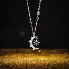 Illuminate your style with our Moon & Eight-pointed Star Necklace featuring a captivating blue diamond. This celestial-inspired piece captures the magic of the night sky, with the moon and star symbolizing dreams and guidance. The addition of the radiant blue diamond infuses a sense of allure, making it a distinct and captivating accessory. Embrace the celestial magic with the Moon & Eight-pointed Star Necklace - a luminous reflection of the cosmos. DETAILS Materials:   925 Sterling Silver, Spin Celestial Star-shaped Silver Jewelry, Celestial Star Jewelry For Jewelry Making, Celestial Star-shaped Sterling Silver Jewelry, Elegant Star-shaped Sun And Moon Necklace, Elegant Blue Star Charm Jewelry, Elegant Blue Jewelry With Star Charm, Celestial Star-shaped Jewelry Gift, Mystical Silver Star-shaped Jewelry, Celestial Star Jewelry For Gifts