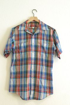 Vintage Plaid Multicolored Short Sleeve Two Pocket Western Button Up Shirt (Sz M) Brand Is Unknown Multicolor Button-up Shirt With Pockets, Multicolor Shirt With Spread Collar And Buttons, Multicolor Spread Collar Shirt With Buttons, Plaid Button-up Short Sleeve Shirt, Multicolor Button-up Shirt With Button Closure, Plaid Short Sleeve Button-up Shirt, Multicolor Spread Collar Top With Button Closure, Multicolor Tops With Spread Collar And Button Closure, Multicolor Collared Short Sleeve Cotton Shirt