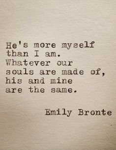 an old typewriter with the words, he's more myself than i am whatever our soul is made of, his and mine are the same