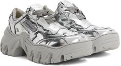 Handcrafted low-top buffed faux-leather sneakers in silver-tone. Fading throughout. · Logo embossed at vamp and tongue · Lace-up closure · Padded tongue and collar · Rubberized logo patch at outer side · Breathable faux-leather lining · Sculptural TPU platform midsole · Treaded TPU outsole · Platform: H1.5 in Available exclusively at SSENSE. Supplier color: Silver lava Silver Low-top Sneakers With Textured Sole, Custom Silver Lace-up Sneakers With Rubber Sole, Silver Custom Lace-up Sneakers With Rubber Sole, Silver Lace-up Custom Sneakers With Rubber Sole, Silver Leather Low-top Custom Sneakers, Modern Silver Low-top Custom Sneakers, Luxury Silver Sneakers With Rubber Sole, Custom Silver Sneakers With Rubber Sole For Streetwear, Silver Custom Sneakers With Rubber Sole For Streetwear