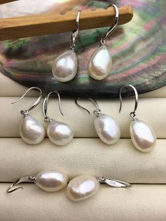 "This pearl is genuine freshwater pearl, 100% real pearl quantity: 1 pair pearl luster: high+ metal: sterling silver pearl shape: 11mm nugget pearl,it's big pearl color: white pearl grade: AAA Back to Other Jewelry Section 01: \"Tahitian,Akoya,Sea Pearl\" Section: https://www.etsy.com/shop/WenPearls?section_id=15806339 02: \"Potato/Near Round Pearl\" Section: https://www.etsy.com/shop/WenPearls?section_id=16378067 03: \"Round Pearl\" Section: https://www.etsy.com/shop/WenPearls?section_id=161632 Silver Pear-shaped Pearl Earrings, Silver Dangle Pearl Earrings With High Luster, Silver Pear-shaped Hypoallergenic Pearl Earrings, Silver Baroque Pearl Earrings For Gift, Silver High Luster Drop Pearl Earrings, Silver High Luster Pearl Earrings For Wedding, Silver Baroque Pearl Pear-shaped Jewelry, Silver Baroque Pearl Jewelry In Pear Shape, Silver Pearl Earrings With High Luster