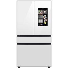 a white refrigerator freezer with pictures on the door and bottom drawer, in front of a white background