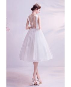 Buy Vintage Simple Short Knee Length Reception Wedding Dress With Sheer Back at wholesale price online. Free shipping and pro custom service since 2009. White A-line Tulle Gown, Tulle Tea-length Wedding Dress, White A-line Dress For Wedding, White A-line Wedding Dress, Elegant Tea Length Dress For Debutante Ball, Elegant Tea-length Dress For Debutante Ball, White A-line Wedding Evening Dress, White A-line Evening Dress For Wedding, White A-line Bridesmaid Dress