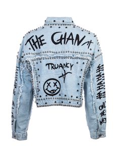 Take your look from basic to bold with this studded denim jacket! This classic jean jacket style gets a rad update with studs and graffiti design in the front and back. The cropped length completes the edgy vibe of this trucker jacket that is made from lightly washed denim. Available in sizes S, M, L and XL. Made out of 100% cotton. Add some edge to your outfit with this casual-cool jean jacket designed in a perfectly relaxed fit. It pairs well with anything in the wardrobe, so the possibilities Edgy Studded Outerwear For Streetwear, Trendy Studded Outerwear For Streetwear, Edgy Medium Wash Denim Jacket, Edgy Cropped Denim Jacket For Streetwear, Trendy Streetwear Outerwear With Rivets, Trendy Outerwear With Rivets For Streetwear, Edgy Medium Wash Outerwear For Streetwear, Punk Style Graphic Print Denim Jacket For Streetwear, Distressed Denim Jacket For Punk Streetwear