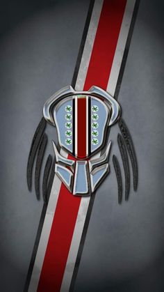 an image of the emblem for a car that is red, white and blue with wings