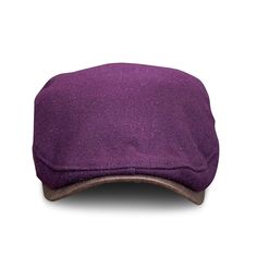 A scally cap for all the aficionados out there keeping history alive and staying curious. This wool blended single panel scally cap boasts a bold cigar wrap brown leatherette brim and a unique color we call 'Homemade Wine.' It is a cross between purple and deep red like a homemade wine. Color: Homemade Wine Material: 85% Poly/15% Wool