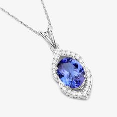 14K White Gold Tanzanite Pendant, Genuine Tanzanite and Diamond Gold Pendant Necklace, Statement Pendant, Fine Tanzanite Gold Pendant Bright, beautiful colors make this halo pendant into a one-of-a-kind statement piece you'll love. Our 2.44 ct. t.w. oval genuine tanzanite pendant necklace is set in polished fine finish 14k white gold for a divine look at a smart price. 14k gold tanzanite and diamond pendants are a gorgeous and elegant way to adorn your neck and enhance your outfit. These pendant White Gold Tanzanite Pendant Necklace, Sapphire Necklaces With Accent Stones Fine Jewelry, Formal Necklace With Oval Pendant And Accent Stones, Formal Oval Pendant Necklace With Accent Stones, Tanzanite Gemstone Pendant Necklace, Tanzanite Pendant Necklace For Anniversary, Tanzanite Gemstone Pendant Necklaces, Anniversary Tanzanite Pendant Necklace, Elegant Multi-stone Oval Pendant Necklace