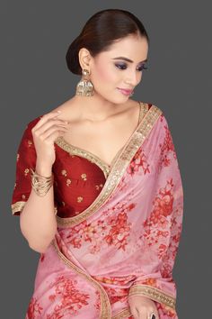 Be highlight of the occasions in this stunning pink embroidered floral organza saree with embroidery! The saree comes with red embroidered saree blouse and blouse piece. Shop designer sarees in USA from Pure Elegance Indian saree store. The actual product may vary slightly from the image. These are custom orders, hence expect slight variation in color, placement of the motif or buta. ESTIMATED DELIVERYBecause this is a custom order, it would take about 3 weeks from the date of purchase. RETURN P Pink Dola Silk Saree For Reception, Pink Art Silk Saree For Reception, Bollywood Style Pink Embroidered Pre-draped Saree, Bollywood Style Embroidered Pink Pre-draped Saree, Pink Georgette Pre-draped Saree With Floral Embroidery, Diwali Pink Embroidered Pre-draped Saree, Pink Embroidered Pre-draped Saree For Diwali, Pink Embroidered Unstitched Fabric For Reception, Pink Embroidered Fabric For Reception Blouse