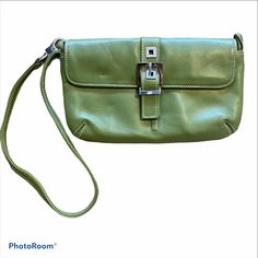 Olive Green Leather With Pink Lining Magnetic Closure Silver Hardware Can Be Worn As A Small Shoulder Bag Soft Leather Has A Few Creases And One Small Scratch On Front Near The Buckle 8.5” X 5” Evening Bags With Wrist Strap, Elegant Clutch With Wrist Strap, Daily Use Clutch With Silver-tone Hardware, Silver-tone Hardware Clutch For Daily Use, Evening Clutch Wristlet, Chic Rectangular Wristlet For Formal Occasions, Elegant Spring Wristlet For Everyday, Elegant Rectangular Wristlet For Spring, Elegant Rectangular Spring Wristlet