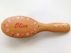 KENT PERSONALISED WOODEN HAIRBRUSH - Garland design NATURAL BRISTLE This top quality hairbrush is made by the renowned manufacturers Kent who have been making hairbrushes since 1777 and are by appointment to HM the Queen. The personalised name will be added to complement the special hand painted design. The wooden brush is made of natural bristle on rubber cushion.  Ideal for straightening and grooming short to shoulder length hair.  Natural bristle is perfect for stimulating the hairs natural o Shoulder Length Hair Natural, Wooden Hairbrush, Garland Design, Wooden Brush, Hm The Queen, Natural Hair Oils, Styling Brush, Hair Natural, Hair Painting