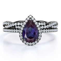 a purple and white diamond ring set