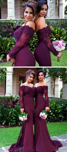 two women in long sleeves and purple dresses posing for the camera with their arms around each other