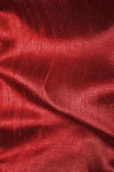 the red fabric is very soft and shiny