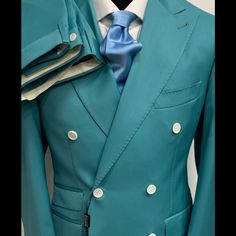 Teal Green Super 150 Cerruti 1881 Summer Wool Double Breasted Suit. Made In Italy. Brand New With Tag Ticket Pocket Double Vent 5 Inch Wide Peak Lapel Flat Front Pant Allow 5-7 Days Delivery To You Via Dhl This Collection Will Exceed Your Expectations. Luxury Double Breasted Suit With Notch Lapel, Luxury Tailored Double Breasted Suit, Luxury Double Breasted Suit, Elegant Green Fitted Double Breasted Suit, Elegant Fitted Green Double Breasted Suit, Luxury Green Suit For Wedding, Luxury Custom Fit Double Breasted Suit, Luxury Double Breasted Suit For Semi-formal Occasions, Luxury Green Formal Suits