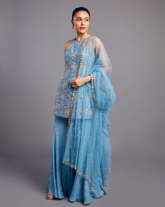 Glamorous glass beads embroidered raw silk kurta paired with sharara and net dupattaFrom Chamee and Palak 's Alora collectionDELIVERY TIMEPlease allow 8-12 weeks for your outfit to arriveFABRIC DETAILSGeorgette, raw silk, and netProfessional cleaning only Blue Indian Outfit, Cocktail Saree, Mehendi Dress, Blue Sharara, Raw Silk Kurta, Cotton Dress Pattern, Tandoori Masala, Punjabi Outfits, Indian Designer Suits