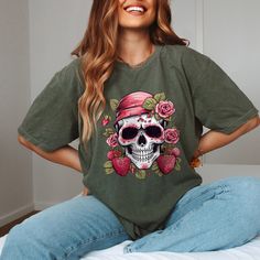 Sugar Skull Flower Shirt, Comfort Colors® Strawberry Skeleton Shirt,  Halloween T-shirt For Women, Flower Skull Shirt, Halloween Party Shirt Welcome to Burma Apparel 🌸 Our soft and comfortable shirts are printed, pressed and shipped to you from our boutique. Enjoy your shopping!🛍️ ✔️Please make sure you check our size cards before you place your order. ✔️Please send me a message for all your questions and suggestions. It is my pleasure to assist you! **Group t-shirts are not sold as a set. They are sold separately. HOW TO ORDER SHIRT 1-) Please, Check and Review all Photos. 2-) From the drop-down menus, choose your T-shirt size and color. 3-) Select the quantity that you want. 4-) Click "ADD TO CART". And, you can go back to add more product color for your family members or You can compl Spring Skull Print Short Sleeve T-shirt, Spring Short Sleeve T-shirt With Skull Print, Casual Spring T-shirt With Skull Print, Spring Skull Print Graphic Tee, Trendy Spring Skull Print Top, Trendy Skull Print Top For Spring, Casual Skull Print Top For Fall, Casual Summer Skull T-shirt, Casual Skull T-shirt For Fall