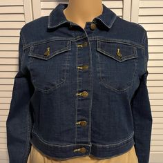 Cool Shorter Style Button Front Denim Jean Jacket . It’s Cotton, Polyester, Spandex Blend. It Is 18” Armpit To Armpit And Is 18” Shoulder To Hem. Calvin Klein Button-up Spring Outerwear, Dark Wash Button-up Denim Jacket With Button Cuffs, Dark Wash Button-up Denim Jacket, Fitted Dark Wash Denim Jacket With Button Cuffs, Medium Wash Denim Jacket With Buttons For Work, Dark Wash Denim Button-up Jacket, Fitted Button-up Denim Jacket, Casual Fitted Denim Jacket With Button Cuffs, Calvin Klein Spring Button-up Outerwear