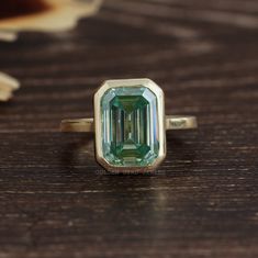 0.50 To 5.00 CT Blue Emerald Cut Moissanite Ring | Solitaire Moissanite Ring For Her | Emerald Cut Engagement Ring | 14K Yellow Gold Ring | Moissanite Wedding Ring | Fancy Colored Moissanite Bridal Set Ring | Bezel Set Moissanite Proposal Ring | Solitaire Emerald Ring For Women | GoldenBirdJewellery Moissanite Gift Ring | Anniversary Emerald Ring For Girlfriend | Birthday Gift Solid Gold Ring | Handcrafted Moissanite Jewelry Collection SKU: 9554 ✥ 𝐌𝐚𝐢𝐧 𝐒𝐭𝐨𝐧𝐞 𝐃𝐞𝐭𝐚𝐢𝐥𝐬 ↣ Shape: Emer Colored Moissanite, Emerald Cut Moissanite Ring, Emerald Cut Engagement Ring, Blue Emerald, Moissanite Bridal Sets, Emerald Cut Engagement, Emerald Cut Moissanite, Ring Bezel, Emerald Engagement Ring Cut