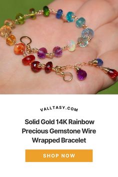 This 14K Solid Gold bracelet features breathtakingly gorgeous precious gemstones in a rainbow color palette. Here I have gathered the most stunning, clear, sparkling AAA quality rondelles faceted and smooth, larger and smaller, and wire wrapped each one separately with a wide Solid Gold 14K wire. As a combination they create a fantastic ombre gradation that shines from across the room. 14k Gold Multicolor Gemstone Jewelry, Multicolor 14k Gold Jewelry With Gemstone Accents, 14k Gold Multicolor Jubilee Bracelet Jewelry, 14k Gold Multi-stone Rainbow Jewelry, 14k Gold Rainbow Multi-stone Jewelry, Multicolor 14k Gold Jubilee Bracelet, Rainbow Multi-stone 14k Gold Jewelry, Multicolor Multi-stone 14k Gold Bracelets, Multicolor 14k Gold Bracelet