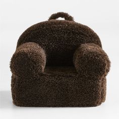 a chair made out of fluffy brown material