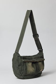 Acid wash crossbody bag by UO's own BDG label. Durable cotton canvas bag with zippered pockets and an adjustable webbing shoulder strap. Urban Outfitters exclusive. Features Crossbody bag from BDG Acid wash cotton canvas Utility style pockets Adjustable webbing strap UO exclusive Content + Care 100% Cotton Spot clean Imported Size Dimensions: 12" h x 16" l x 4" d | BDG Acid Wash Crossbody Bag in Olive, Men's at Urban Outfitters Utility Bags With Functional Pockets For Streetwear, Cotton Streetwear Bags With Pockets, Streetwear Cotton Bags With Pockets, Streetwear Canvas Bags With Pockets, Casual Canvas Crossbody Bag With Multiple Pockets, Green Zipper Closure Bag For Streetwear, Functional Canvas Bags For Streetwear, Outdoor Cotton Shoulder Bag With Zipper Pocket, Green Utility Bags With Pockets