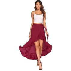 This High Low Skirt Is New With Tags. This Skirt Is Made By Meaneor And Is Wine Red. This Skirt Is A Wrap Skirt With A Tie High Waist And Has Ruffles. This Skirt Is A Sarong And Is A Perfect Swimsuit Coverup. This Skirt Is A Size Medium And Is 100% Rayon. Summer Vacation Maxi Skirt With Ruffles, Summer Vacation Ruffled Maxi Skirt, Summer Flowy Red Maxi Skirt, Red Flowy Maxi Skirt For Summer, Flowy Red Maxi Skirt For Summer, Fitted Red Maxi Skirt For Summer, Fitted Ruffled Skirt For Beach Season, Summer Maxi Skirt With Ruffles For Beach, Vacation Asymmetrical Maxi Skirt With Ruffled Details