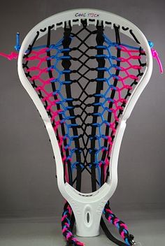 a tennis racquet that has been made out of string and plastic material with pink, blue, and black strings