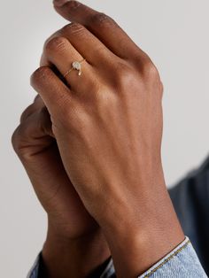 Persée's dainty chain ring is strung with the 'Hand of Fatima', which is also known as the protective Hamsa. It's cast from 18-karat gold and dusted with shimmering diamonds, leaving just one dangling from the middle finger to show off the brand's signature "pierced" technique. Fine Jewelry Open Ring With Single Diamond, Promise Yellow Gold Jewelry With Single Cut Diamonds, Luxury Single Diamond Jewelry For Promise, Silver 14k Gold Fine Jewelry Chain Ring, Single Diamond White Gold Jewelry In Recycled Gold, White Gold Jewelry With Single Diamond In Recycled Gold, Recycled Gold Promise Ring With Single Cut Diamonds, White Gold Single Diamond Jewelry In Recycled Gold, Promise Jewelry With Rose Cut Diamonds In Recycled Gold