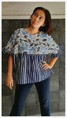 "Hello... This time I made a batik shirt, which is made of cotton, with a beautiful combination of batik made with the stamped batik technique. I made this batik shirt in all sizes. loose so that it is comfortable to wear. -material: Cotton batik ❤ this blouse fit from size M to size XL *Bust= 116 cm ( 45,7\") *Waist= loose *Hips= loose *Sleeves length= 27 cm (10,6\") *Shirt Length from shoulder= 66 cm( 26\") -Closure: button ** Model: Height= 166 cm Weight= 60 kg *Care instruction: -Gently hand Mode Batik, Batik Technique, Batik Top, Batik Blouse, Indonesian Batik, Batik Shirt, Loose Sleeves, Peasant Blouse, Summer Tops