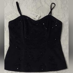 Check Out This Gorgeous New Old Stock Black Beaded Corset Top With Adjustable Straps And A Sexy Zip Up Back. Fully Lined And Silky Smooth. Size Medium. Straps Are Removable As Well. Never Worn. Tags Attached And Comes With Replacement Beads. 16.25" Armpit To Armpit 16" Total Length Not Including Adjustable Straps Smoke Free Home Fast Shipping Embellished Sleeveless Corset, Embellished Elegant Corset For Night Out, Elegant Embellished Corset For Night Out, Sequin Sleeveless Corset, Summer Embellished Corset For Night Out, Elegant Embellished Summer Corset, Elegant Summer Embellished Corset, Black Embellished Fitted Corset, Black Embellished Sleeveless Corset