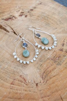 A unique dressy pair of statement silver earrings. These feature labradorite bezels, jade beads, and Czech glass beads. A great piece to dress up any outfit! Length = 2.5 inches Dainty Handmade Teardrop Threader Earrings, Threader Earrings Gold, Minimal Gold, Silver Statement Earrings, Labradorite Earrings, Jade Earrings, Blue Apatite, Earrings Unique, Threader Earrings