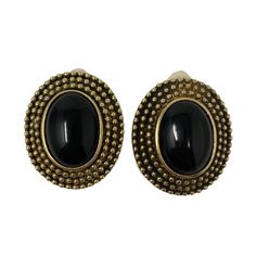 "Gorgeous vintage statement earrings! Bronze colored metal with black glass cabochons Clip ons  Circa 1980s New old stock  Never worn  Measure 1 5/8\" long & 1 3/8\" wide  Great vintage condition. Please enjoy!  Thanks for visiting ♥" Black Cabochon Earrings For Evening, Evening Black Cabochon Earrings, Vintage Gold Clip-on Earrings With Black Enamel, Vintage Black Oval Earrings, Black Oval Vintage Earrings, Black Metal Clip-on Earrings For Evening, Black Metal Costume Jewelry Earrings, Vintage Cabochon Earrings For Evening, Vintage Cabochon Metal Earrings