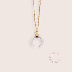 Elevate your style with this exquisite Crescent Moon Pendant made with sustainably sourced cow bone, crafted with high quality recycled 925 sterling silver with 18k gold plating. ------ D E T A I L S ------ * Material: 925 sterling silver with 18k gold plating * Safe for sensitive skin * Hypoallergenic, lead and nickel-free * Handcrafted in collaboration with artisans in Indonesia and India * Made with sustainable recycled materials  ------ D E L I V E R Y ------ All deliveries are done through White Sterling Silver Necklace With Moon Charm, Dainty White Necklace With Moon Charm, White Crescent Handmade Necklace, Handmade White Crescent Necklace, White Moon Charm Necklace, White Dainty Jewelry With Moon Charm, Everyday White Jewelry With Moon Charm, Everyday White Moon Charm Jewelry, White Moon Phase Necklace