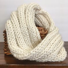 "Single loop, knit infinity scarf is soft, cozy, stretchy, and has a little weight to it Cream colored yarn has a prerry, silky shine 36\" loop, 6\" wide (stretches to 15\") Material: Lion Brand \"Hometown\" yarn, 100% acrylic" Cozy Knit Infinity Scarf, Soft Knit Infinity Scarf For Fall, Soft Knit One Size Infinity Scarf For Fall, Fall Infinity Scarf In Soft Knit, Soft Knit Scarves For Cold Weather, Chunky Knit One-size Infinity Scarf, Cozy Infinity Loop Scarf For Fall, Cold Weather Knit Scarves, Cold Weather Soft Knit Scarves