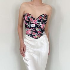 Measurements: Waist: up to 29"; adjustable hook-and-eye back closure. Label: 36C -- Best fits sizes 36C/34D. Condition: Used - Excellent Material: Polyester, Nylon, Spandex Model is 5′ 6″ and wears the size XS. (Cup size: 30A, bust 30″, waist 26″, hips 37″) Returns, exchanges, and refunds are not accepted. Please read measurements in each product page carefully before purchasing to ensure the item fits. If you have any questions about specific clothing please contact us at message before placing an order. Evening Corset Belt With Boning, Elegant Spring Corset With Boning, Evening Overbust Corset Belt With Boning, Elegant Strapless Corset Belt For Spring, Evening Corset Belt With Boned Bodice, Evening Boned Bodice Corset Belt, Fitted Strapless Black Bodice, Evening Corset Belt With Boning And Fitted Bodice, Fitted Strapless Satin Corset Belt