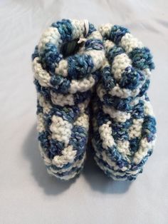 Soft comfy slippers for your adorable little one! Keep their little toes warm in these handmade knitted  slippers. Only high quality /vegan yarn /vegan thread are used in making these slippers. Machine wash and dry Cozy Knitted Slippers With Round Toe, Crochet Round Toe Slippers For Winter, Winter Crochet Slippers With Round Toe, Hand Knitted Round Toe Slippers For Winter, Hand Knitted Round Toe Winter Slippers, Hand-knitted Round Toe Winter Slippers, Cozy Hand Knitted Slippers With Round Toe, Cozy Hand-knitted Slippers With Round Toe, Cozy Hand-knitted Round Toe Slippers