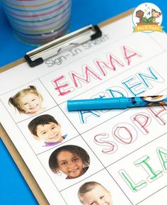 a clipboard with children's names on it next to a cup of coffee