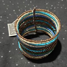 Wire Cuff Hand Beaded Seed Bead Cuff Beautiful Combination Wide 1 1/2 Inches Blue Beaded Bangle Cuff Bracelet, Blue Beaded Cuff Bangle Bracelet, Blue Beaded Stretch Bangle Bracelet, Adjustable Blue Cuff Bracelet For Party, Bohemian Blue Cuff Bracelet With Colorful Beads, Bohemian Blue Cuff Bracelet With Round Beads, Bohemian Blue Cuff Bracelet For Party, Bohemian Blue Beaded Cuff Bracelet, Bohemian Blue Beaded Bangle